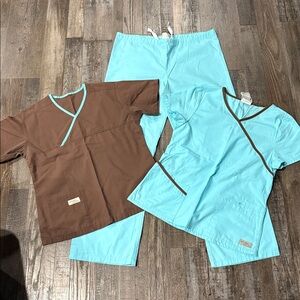 Urbane scrubs matching set. Turquoise pants with 2 matching scrub tops